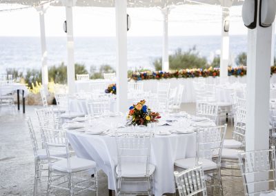 Malta wedding outdoor reception setup by the sea with decorated tables