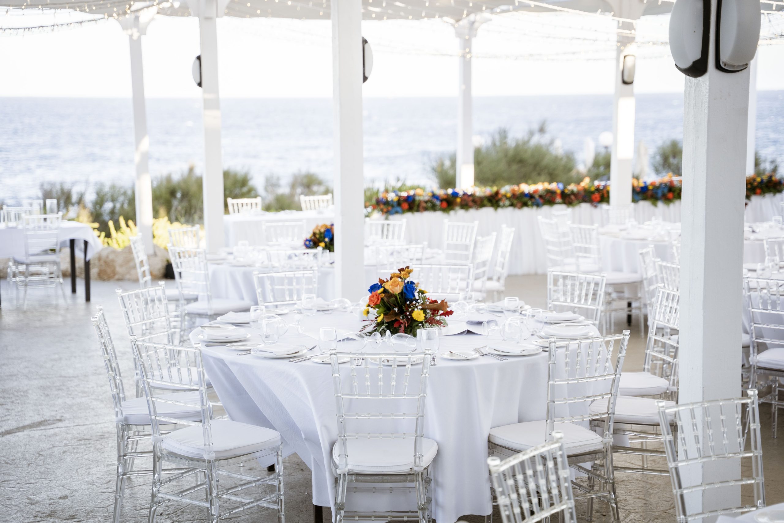 malta-wedding-outdoor-reception Malta wedding outdoor reception setup by the sea with decorated tables